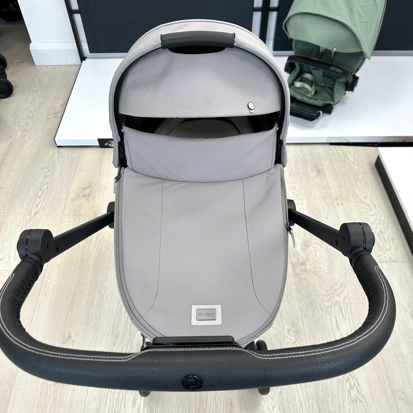 Ex Display Cybex Mios with Black Frame, Grey Carrycot & Green Seat Unit